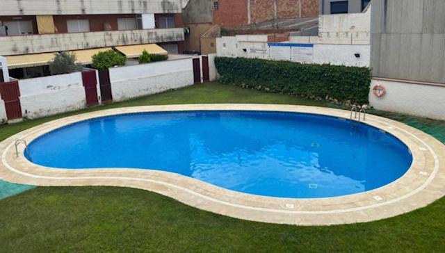 Apartamento con terraza y piscina en Malgrat de Mar Exterior foto